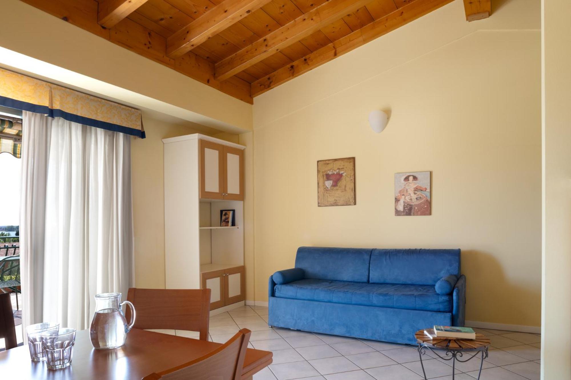 Le Terrazze Sul Lago Hotel & Residence Паденге-суль-Гарда Экстерьер фото